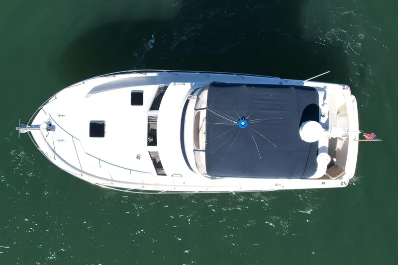 Slide: The Image of Overhead view of 1985 Chris-Craft 382 Commander boat on water. - 7