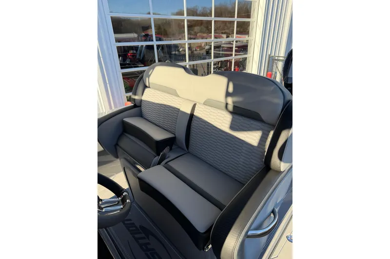 Slide: The Image of 2026 Sunsation 32CCX boat interior with luxurious gray seating and modern design. - 10
