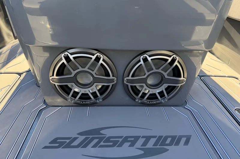 Slide: The Image of 2026 Sunsation 32CCX boat with dual JL Audio speakers on deck. - 11
