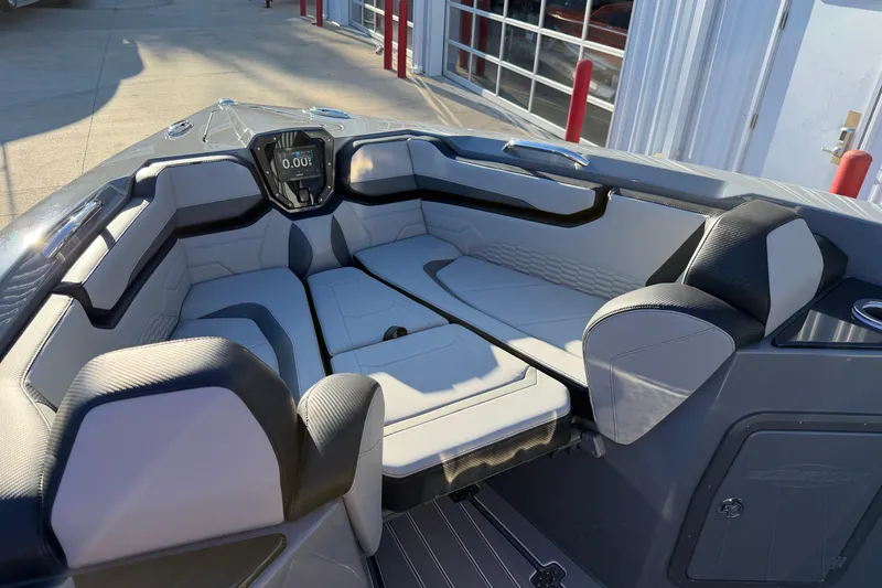 Slide: The Image of Luxurious interior of 2026 Sunsation 32CCX boat with modern seating and dashboard. - 13