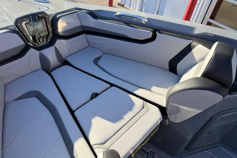 Slide: The Image of 2026 Sunsation 32CCX boat interior with modern seating and digital display. - 15