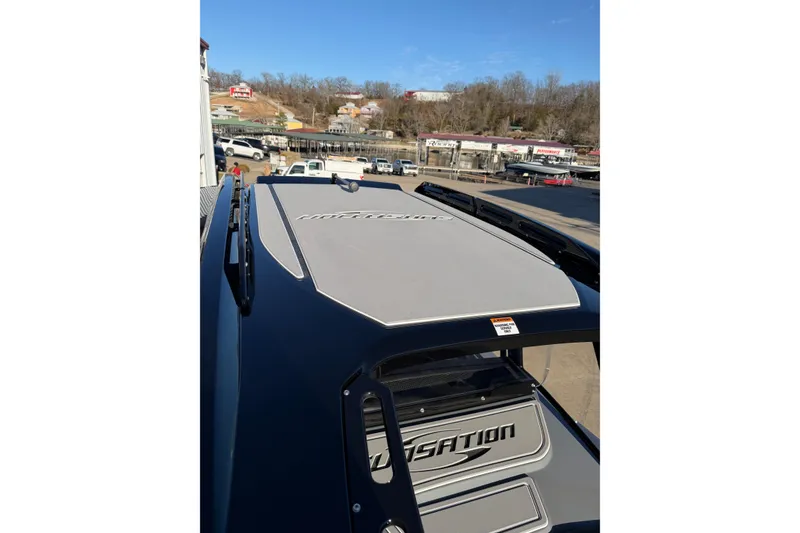 Slide: The Image of 2026 Sunsation 32CCX boat docked, showcasing sleek design and branding. - 18