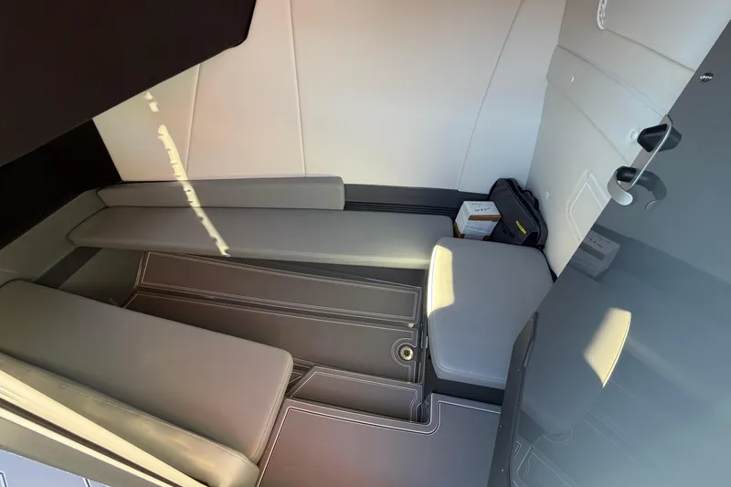 Slide: The Image of 2026 Sunsation 32CCX cabin interior with sleek seating and modern design. - 23