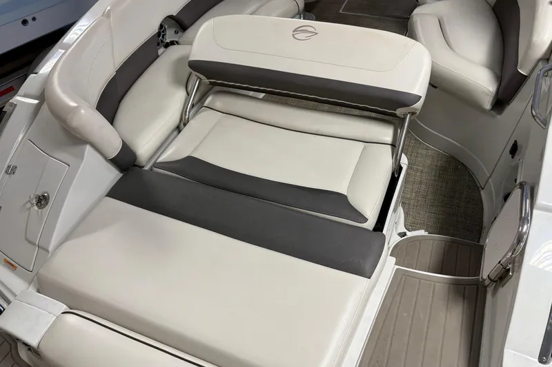 Slide: The Image of 2017 Crownline 275 SS boat interior with white and gray seating. - 7