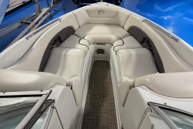 Slide: The Image of 2017 Crownline 275 SS boat interior with plush seating and sleek design. - 8