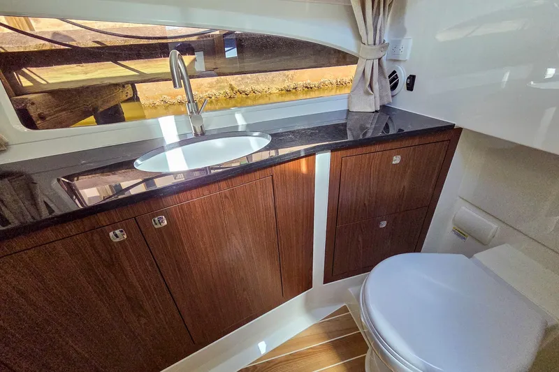 Slide: The Image of 2026 Marex 330 Scandinavia yacht with sleek design and luxurious deck. - 24