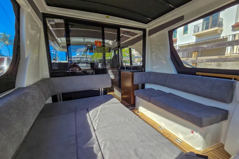 Slide: The Image of Luxurious cabin interior of 2026 Marex 330 Scandinavia yacht with cozy bed and wooden accents. - 9