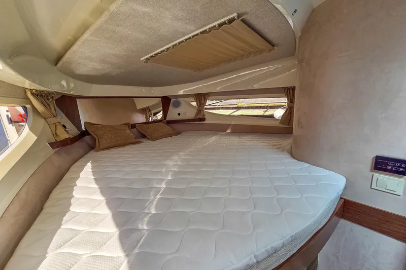 Slide: The Image of Luxurious cabin interior of 2026 Marex 330 Scandinavia with cozy bedding and elegant design. - 28