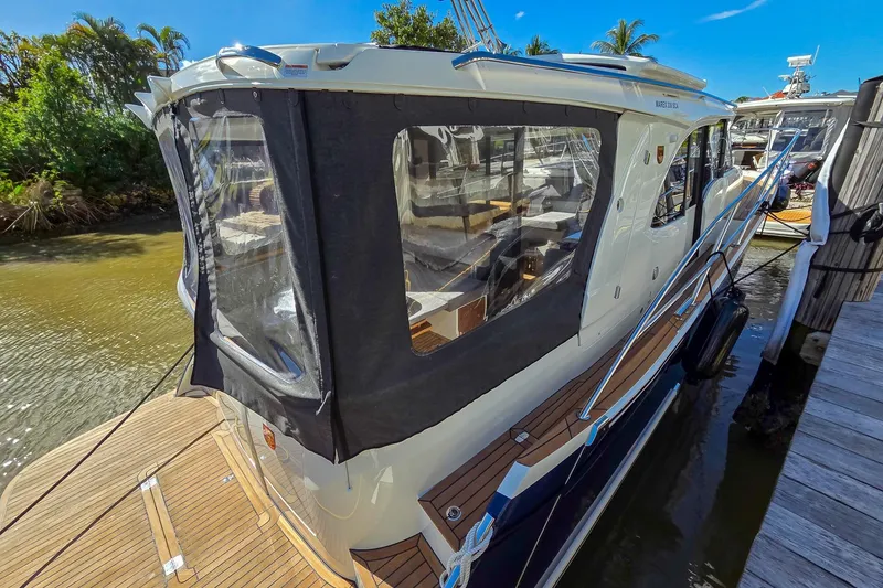 Slide: The Image of 2026 Marex 330 Scandinavia yacht docked, featuring sleek design and modern amenities. - 1