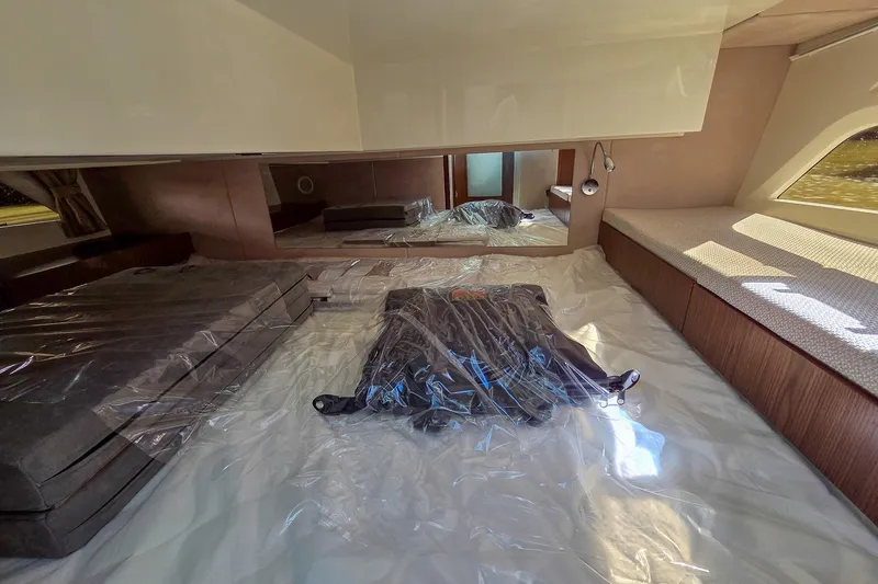 Slide: The Image of Interior of 2026 Marex 330 Scandinavia boat, featuring spacious cabin with modern design. - 23