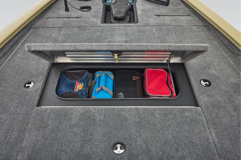 Slide: The Image of Manufacturer Provided Image: 2026 Tracker Pro Team 195 boat storage compartment with organized gear bags. - 29