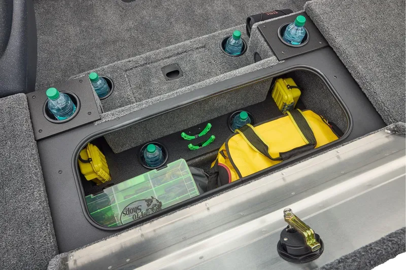 Slide: The Image of Manufacturer Provided Image: 2026 Tracker Pro Team 195 storage compartment with gear, water bottles, and tackle box. - 31