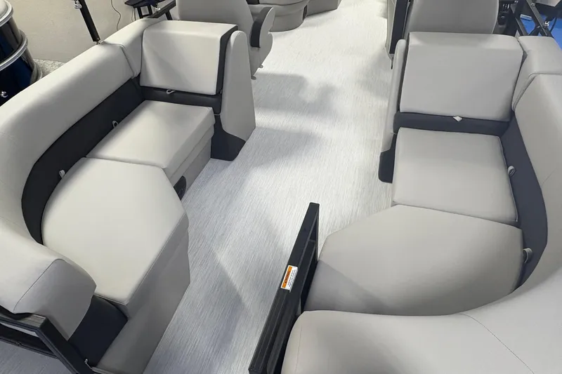 Slide: The Image of Luxurious seating inside 2026 Dockside 22DQ boat, featuring modern gray upholstery. - 4