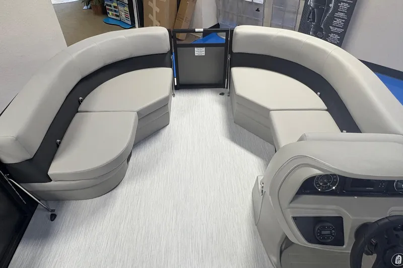 Slide: The Image of Interior of 2026 Dockside 22DQ boat with modern seating and control panel. - 5