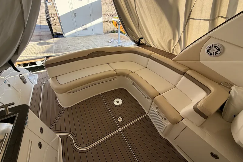 Slide: The Image of Luxurious seating area on 2014 Sea Ray 370 Sundancer yacht with elegant wood flooring. - 22