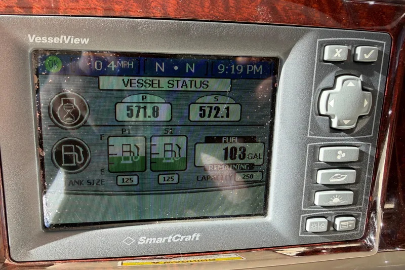 Slide: The Image of SmartCraft VesselView display on 2014 Sea Ray 370 Sundancer showing vessel status and fuel levels. - 38