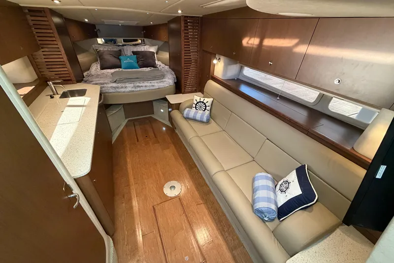 Slide: The Image of Luxurious interior of 2014 Sea Ray 370 Sundancer yacht with cozy seating and elegant design. - 44