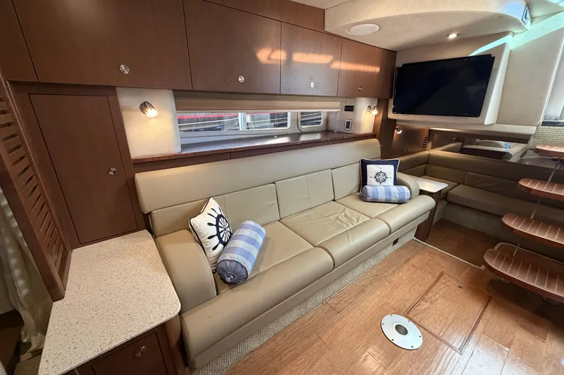 Slide: The Image of Luxurious interior of 2014 Sea Ray 370 Sundancer yacht with leather seating and modern amenities. - 47