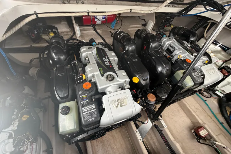 Slide: The Image of Engine compartment of a 2014 Sea Ray 370 Sundancer with dual V8 engines. - 66
