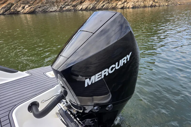 Slide: The Image of 2023 Bayliner Trophy T24CC with Mercury outboard engine on water. - 18