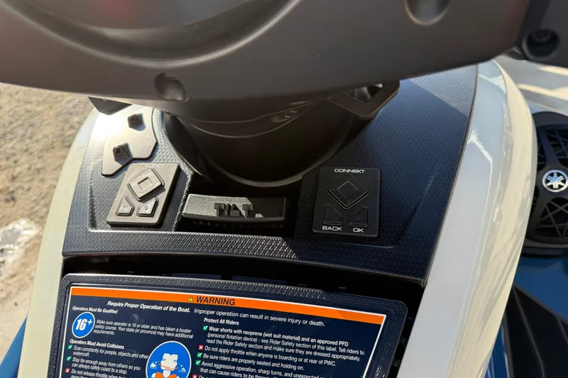 Slide: The Image of Close-up of 2025 Yamaha WaveRunner FX Limited SVHO dashboard controls and warning label. - 13