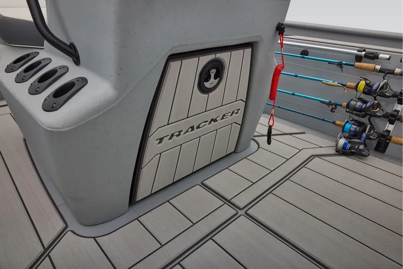 Slide: The Image of Manufacturer Provided Image: 2026 Tracker Bass Tracker Classic CC boat interior with fishing rod holders and storage. - 34