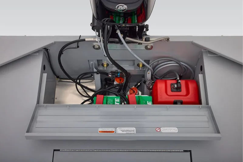 Slide: The Image of Manufacturer Provided Image: 2026 Tracker Bass Tracker Classic CC boat engine compartment with wiring and fuel tank. - 43