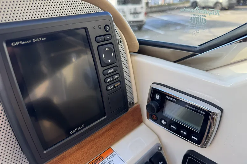 Slide: The Image of Dashboard of 2016 Chris-Craft Corsair 25 with Garmin GPS and Fusion audio system. - 18