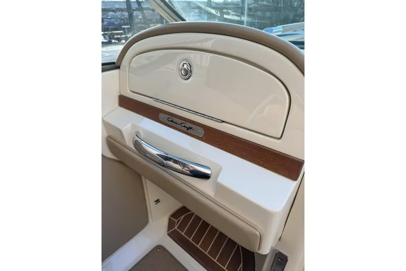 Slide: The Image of 2016 Chris-Craft Corsair 25 interior detail with elegant design and chrome accents. - 20