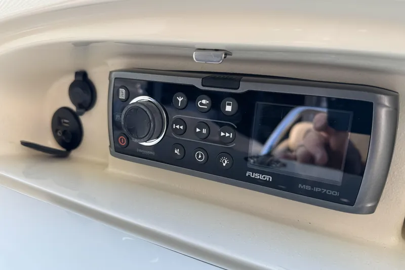 Slide: The Image of Fusion MS-IP700i stereo system on 2016 Chris-Craft Corsair 25 boat dashboard. - 22