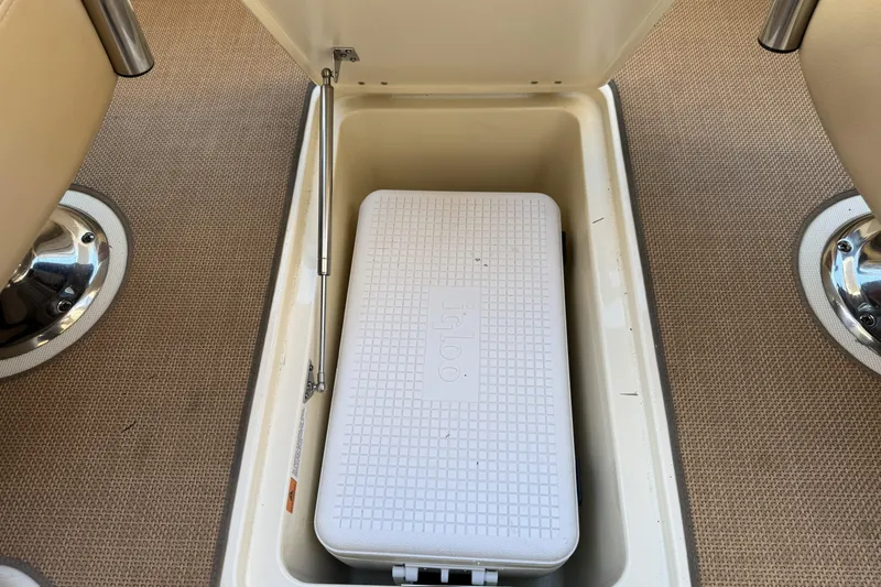 Slide: The Image of Storage compartment with Igloo cooler on 2016 Chris-Craft Corsair 25 boat. - 25