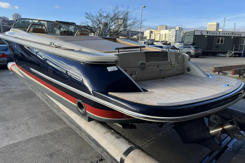Slide: The Image of 2016 Chris-Craft Corsair 25 boat with sleek design, docked at marina. - 6