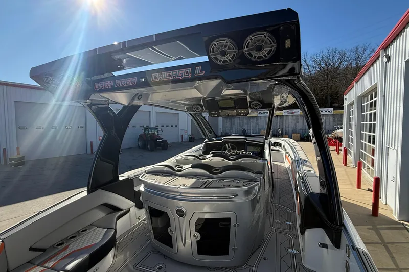 Slide: The Image of 2017 MTI 42V boat interior with sleek design and advanced audio system. - 10