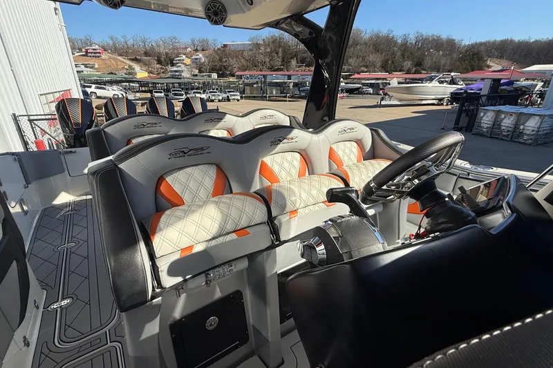 Slide: The Image of 2017 MTI 42V boat interior with luxury seating and modern steering wheel. - 19