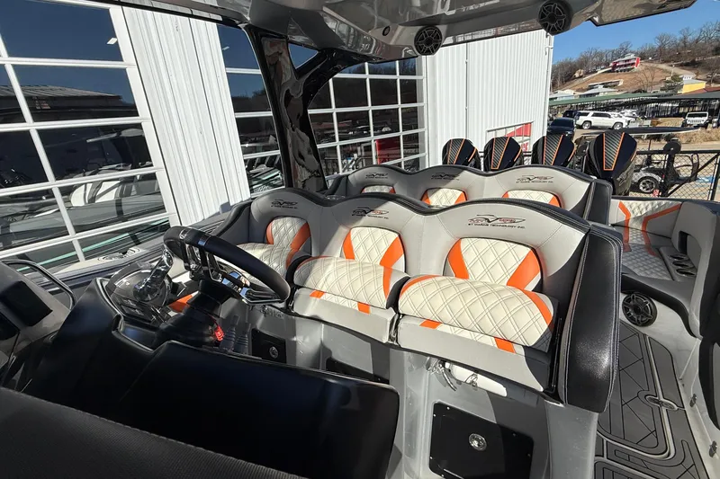 Slide: The Image of 2017 MTI 42V boat interior with luxury seating and modern dashboard. - 20