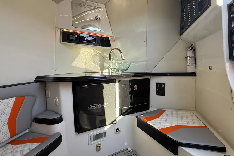 Slide: The Image of Luxurious 2017 MTI 42V boat interior with modern kitchenette and seating. - 22