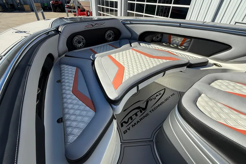 Slide: The Image of Luxurious 2017 MTI 42V boat interior with custom seating and stylish design. - 28