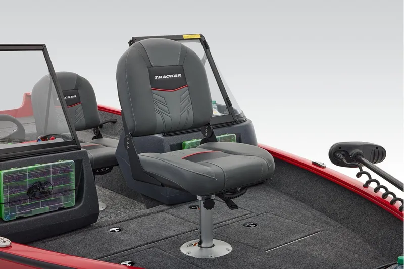 Slide: The Image of Manufacturer Provided Image: 2026 Tracker Pro Guide V-16 WT boat interior with gray seating and fishing gear. - 19