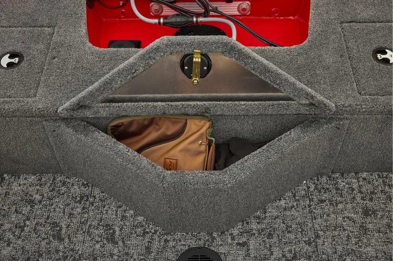 Slide: The Image of Manufacturer Provided Image: 2026 Tracker Pro Guide V-16 WT boat storage compartment with brown bag inside. - 37