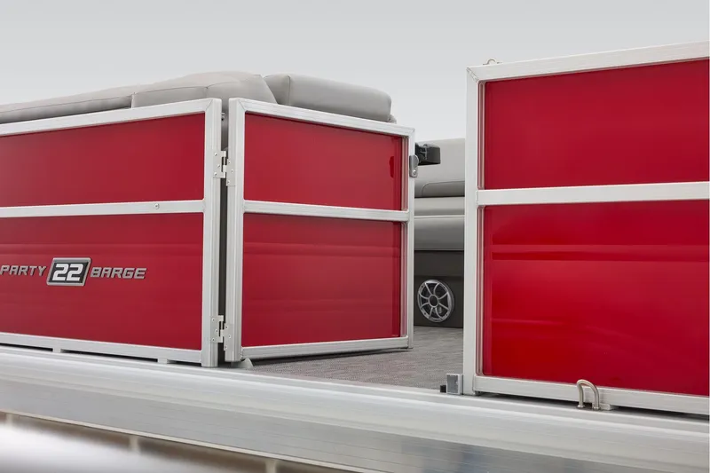Slide: The Image of Manufacturer Provided Image: 2026 Sun Tracker Party Barge 22 DLX with red paneling and comfortable seating. - 74