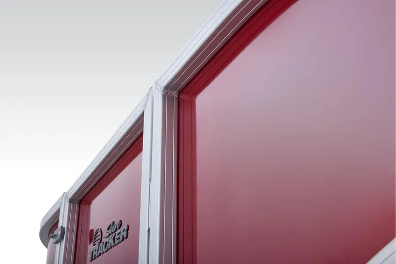 Slide: The Image of Manufacturer Provided Image: Close-up of 2026 Sun Tracker Party Barge 22 DLX, featuring sleek red paneling. - 80