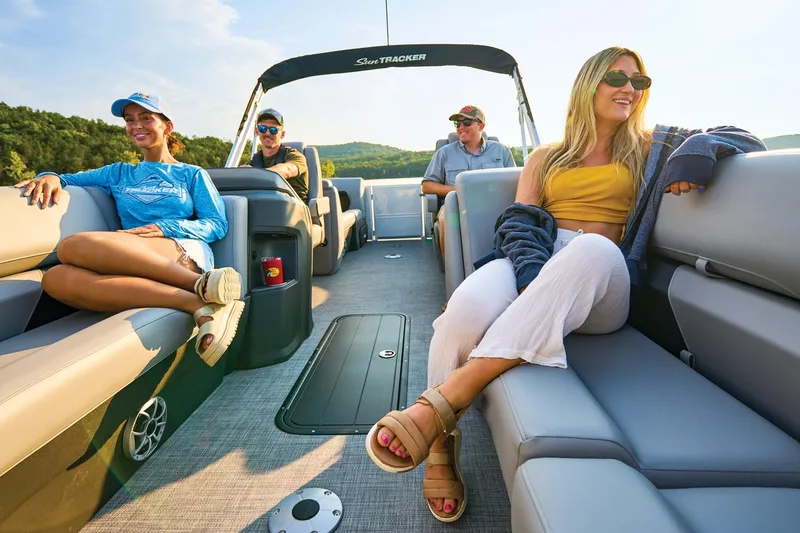 Slide: The Image of Manufacturer Provided Image: 2026 Sun Tracker Party Barge 22 XP3 with passengers enjoying a sunny day on the water. - 13