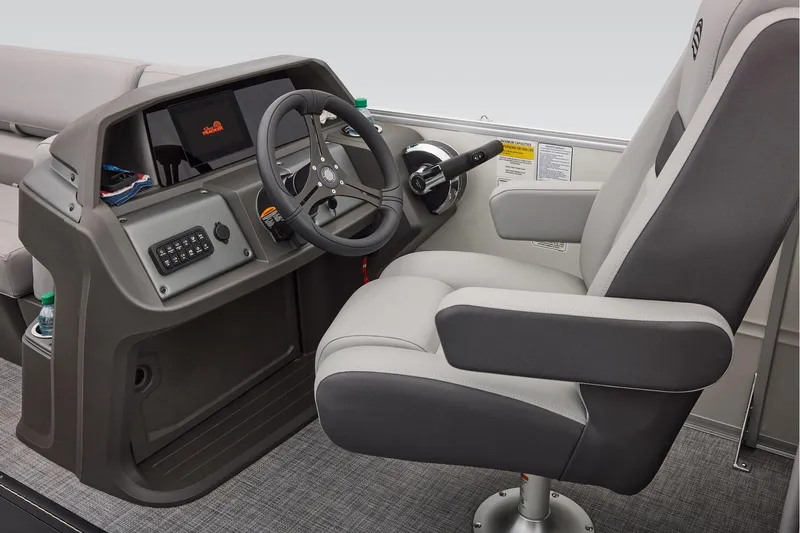 Slide: The Image of Manufacturer Provided Image: Captain's chair and helm of 2026 Sun Tracker Party Barge 22 XP3 pontoon boat. - 49
