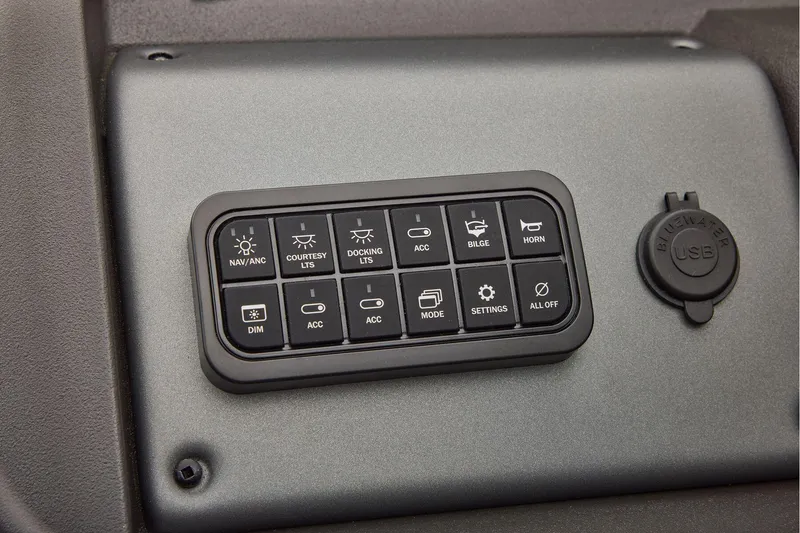 Slide: The Image of Manufacturer Provided Image: Control panel of 2026 Sun Tracker Party Barge 22 XP3 with various function buttons. - 52