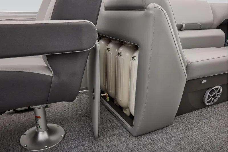 Slide: The Image of Manufacturer Provided Image: 2026 Sun Tracker Party Barge 22 XP3 interior storage compartment with seating and speaker. - 64