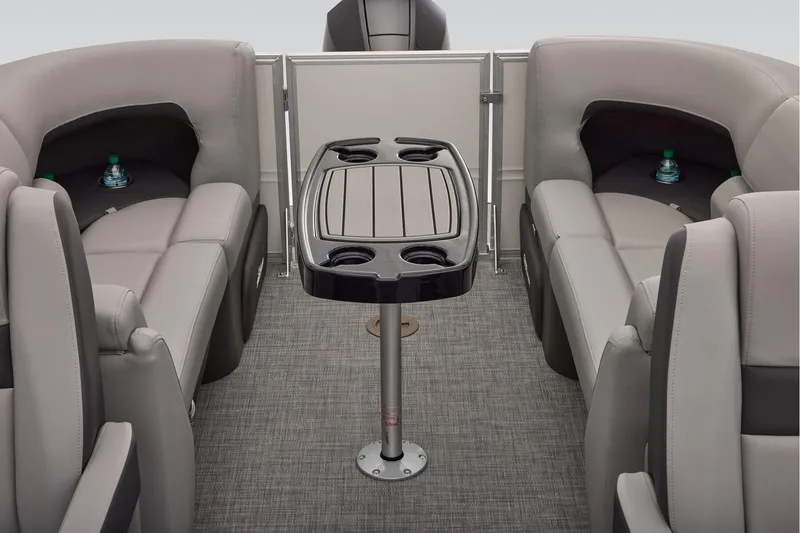 Slide: The Image of Manufacturer Provided Image: 2026 Sun Tracker Party Barge 22 XP3 interior with gray seating and central table. - 66