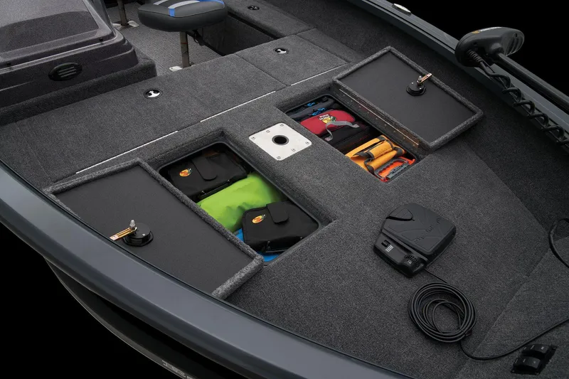 Slide: The Image of Manufacturer Provided Image: Manufacturer Provided Image: 2025 Ranger VS1665SC boat interior with organized storage compartments and fishing gear. - 12