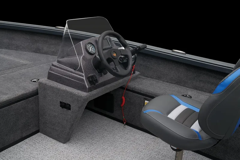 Slide: The Image of Manufacturer Provided Image: Manufacturer Provided Image: 2025 Ranger VS1665SC boat interior with steering console and cushioned seat. - 18