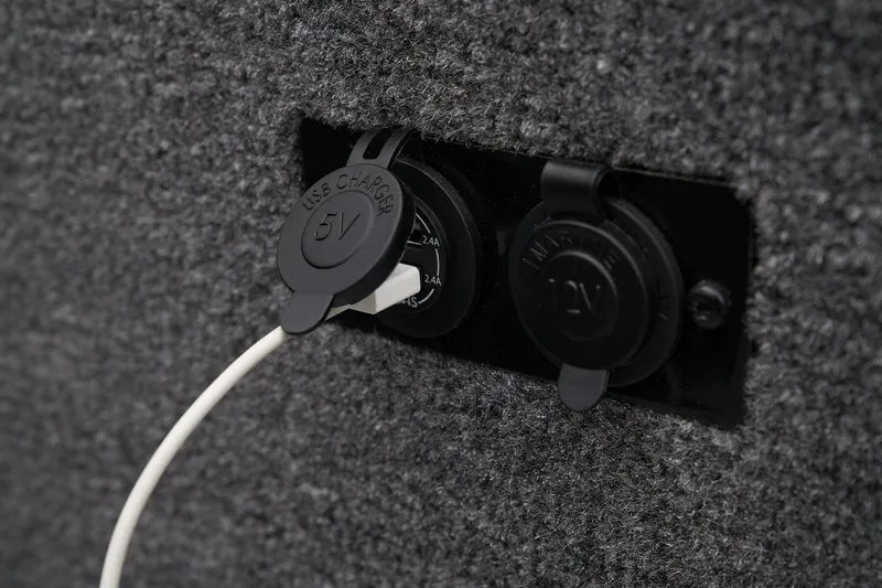 Slide: The Image of Manufacturer Provided Image: Manufacturer Provided Image: USB charging port in 2025 Ranger VS1665SC boat interior. - 21