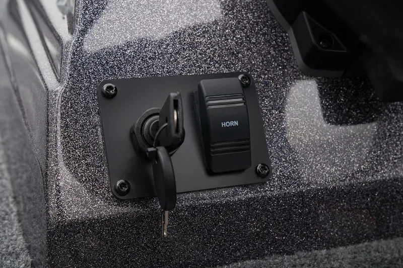 Slide: The Image of Manufacturer Provided Image: Manufacturer Provided Image: 2025 Ranger VS1665SC boat ignition and horn switch panel with key inserted. - 28